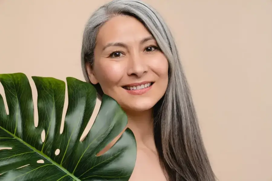 asian woman green leaf